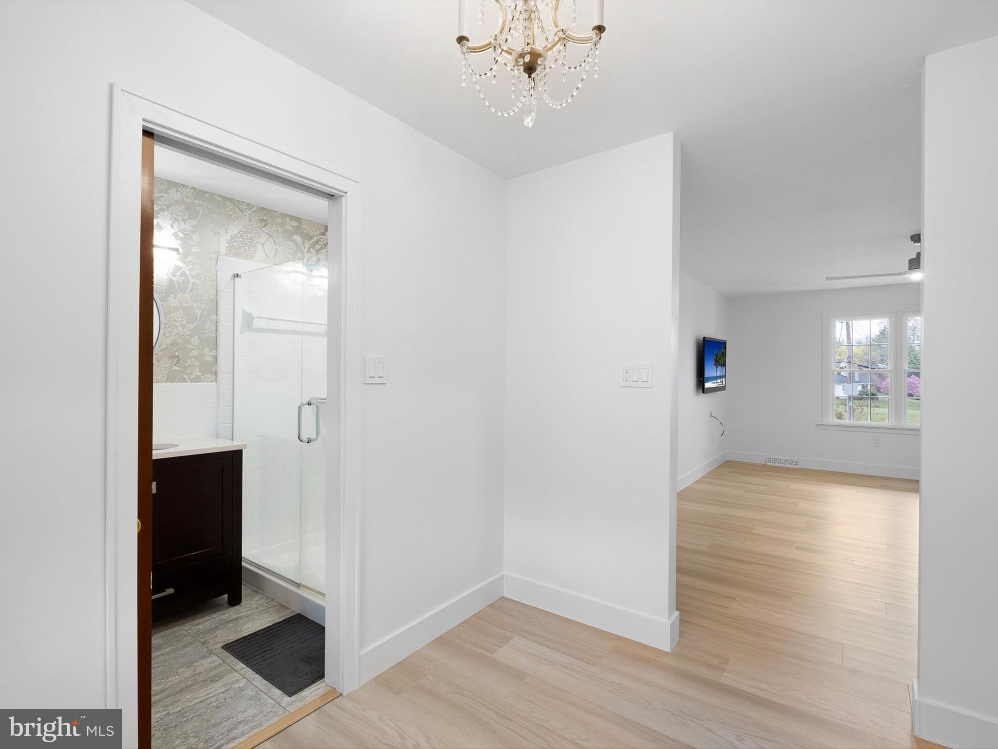 2 Windy Road Wilmington, DE 19810 - Photo 28 of 49 wooden floor in an empty room with a mirror