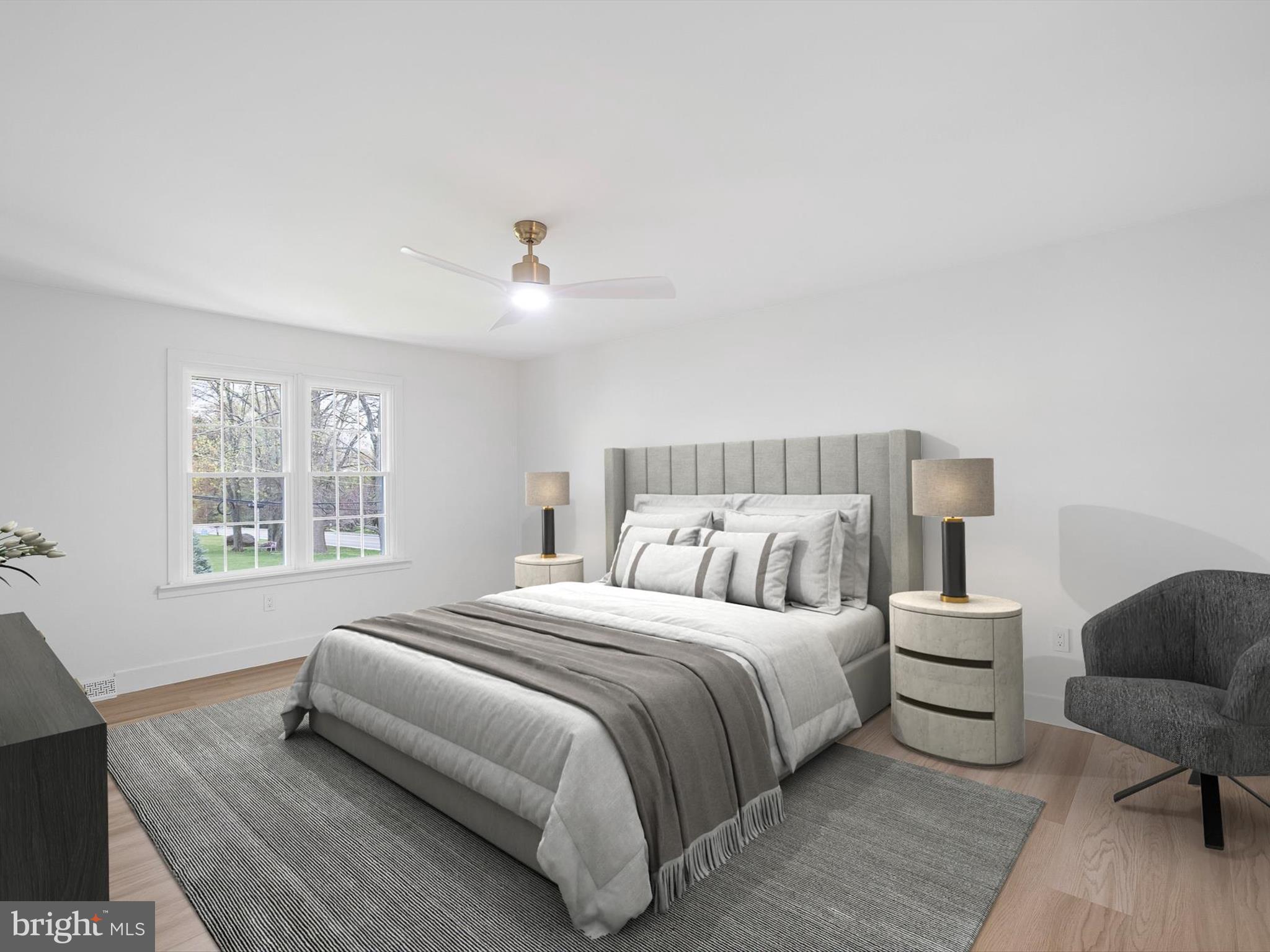 2 Windy Road Wilmington, DE 19810 - Photo 3 of 49 a bedroom with a bed and wooden floor