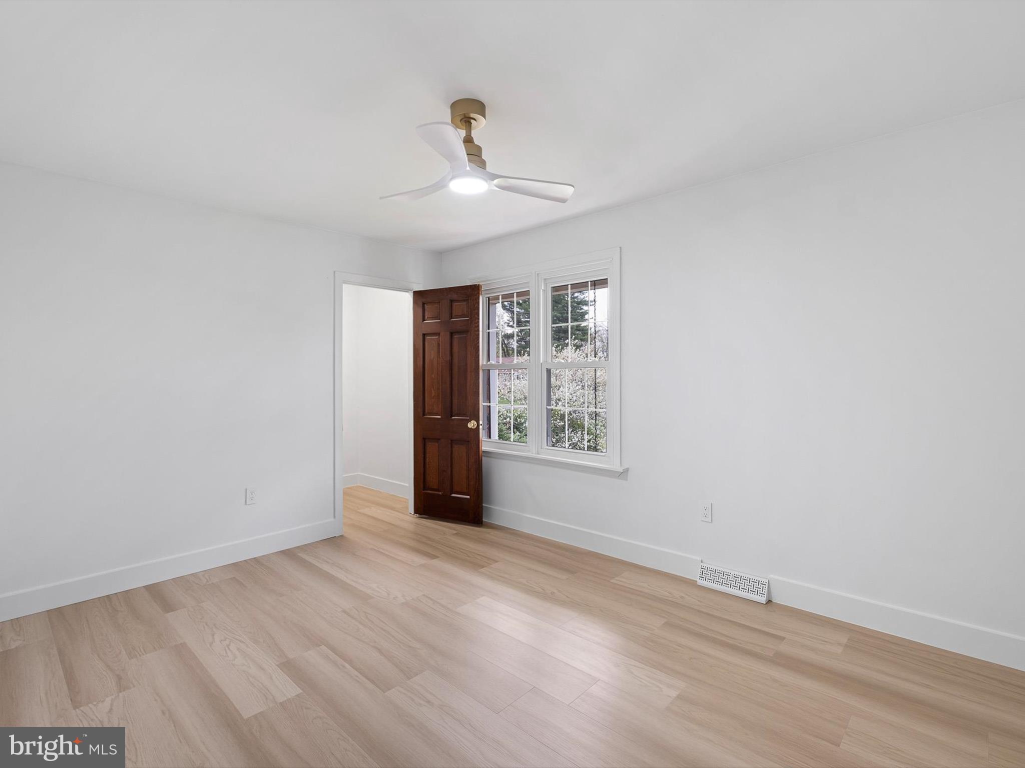 2 Windy Road Wilmington, DE 19810 - Photo 36 of 49 wooden floor in an empty room with a window