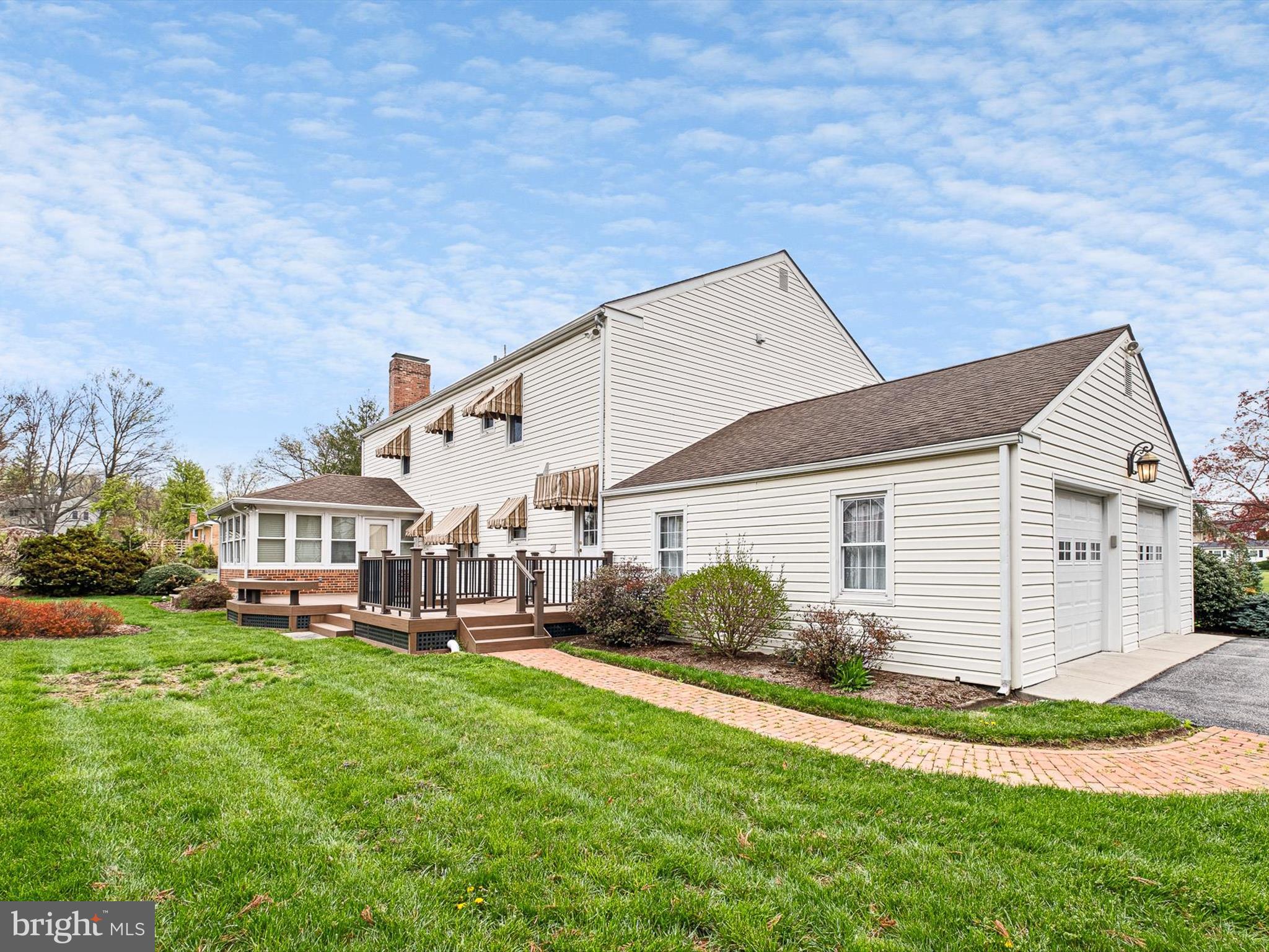 2 Windy Road Wilmington, DE 19810 - Photo 45 of 49 a front view of a house with a garden and plants