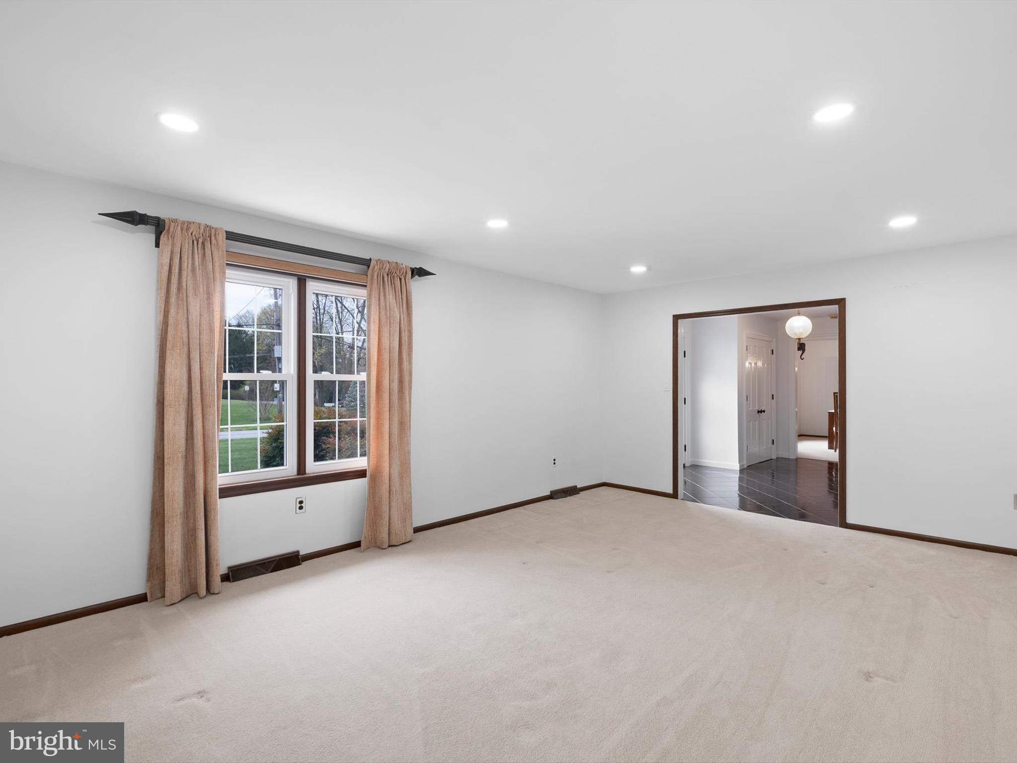 2 Windy Road Wilmington, DE 19810 - Photo 8 of 49 a view of an empty room with a window