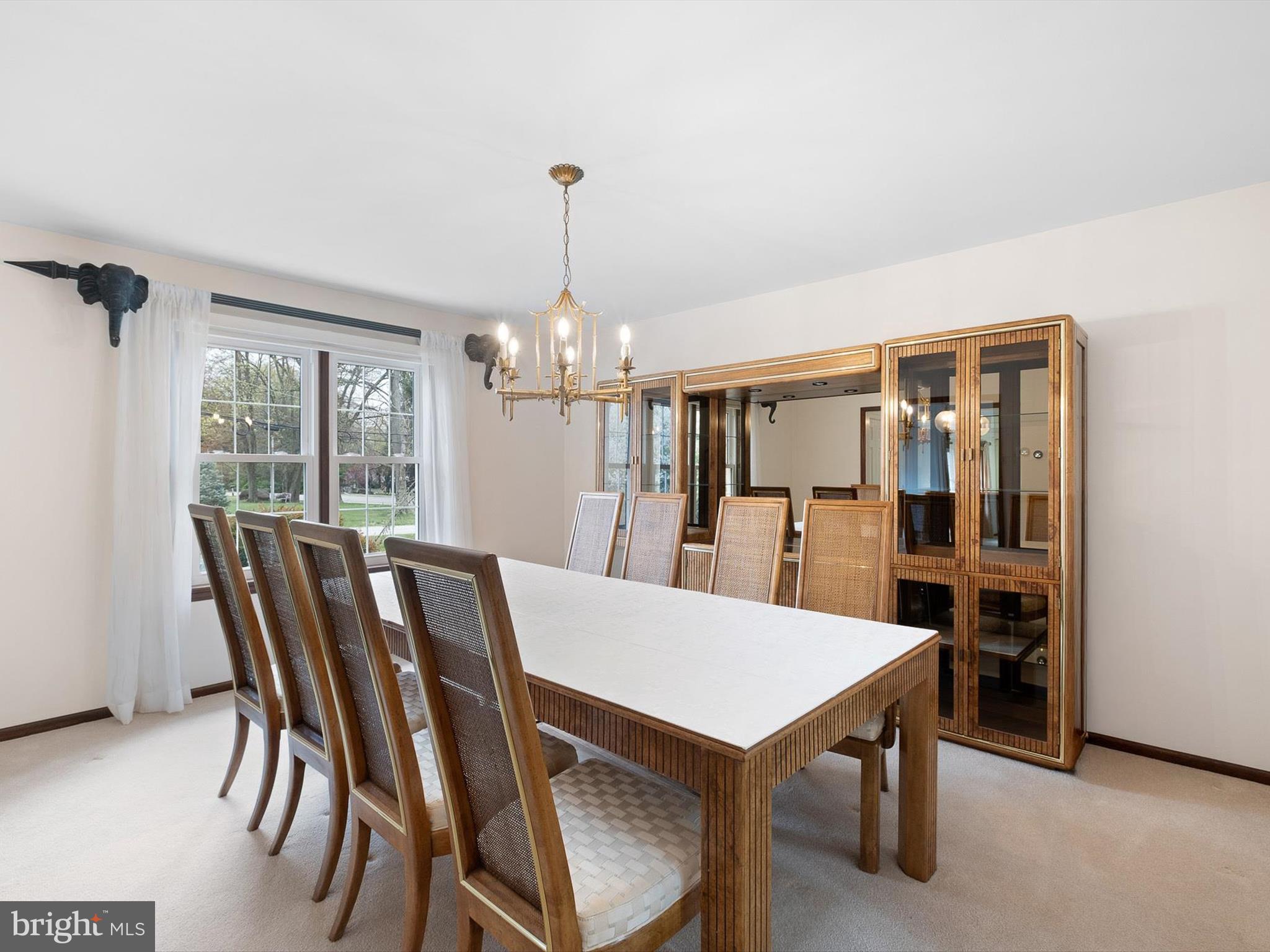 2 Windy Road Wilmington, DE 19810 - Photo 10 of 49 a view of a dining room with furniture window and wooden floor