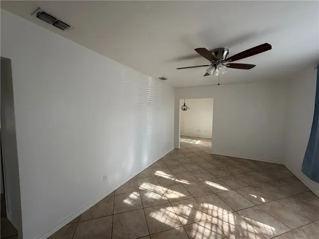 a view of a big room with carpet