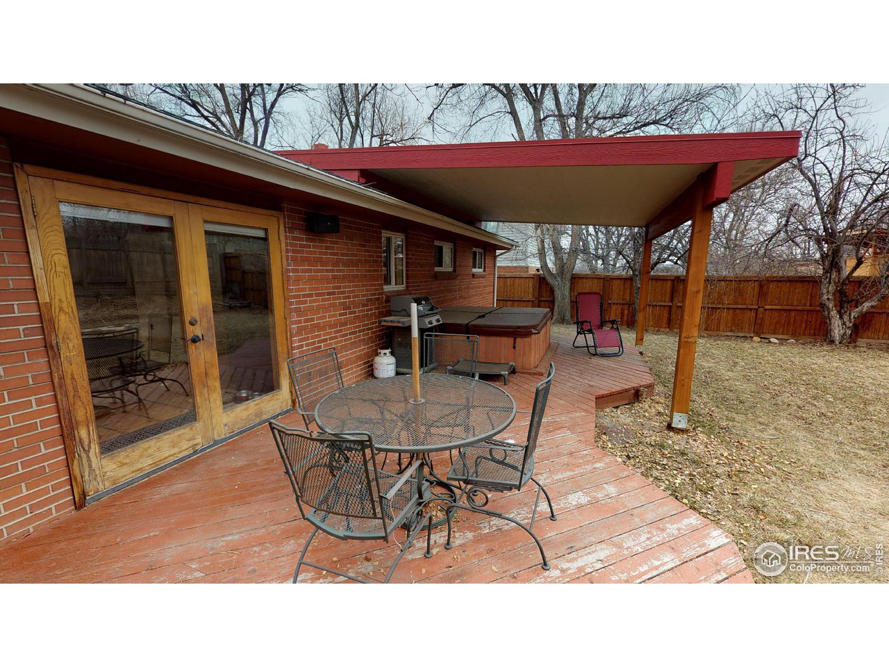 4480 Whitney Place Boulder, CO 80305 - Photo 9 of 17 a patio with table and chairs