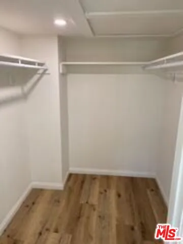 a view of an empty walk in closet
