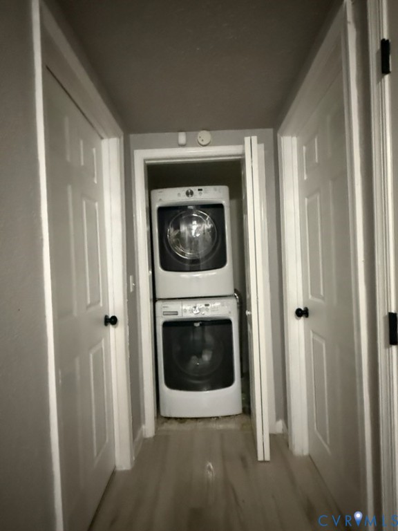 449 Colonial Trail West Dendron, VA 23839 - Photo 12 of 21 Laundry room with stackable washer and dryer