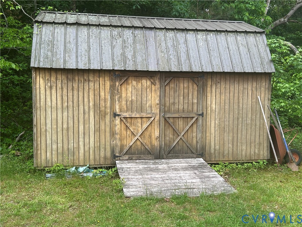 449 Colonial Trail West Dendron, VA 23839 - Photo 20 of 21 Storage shed