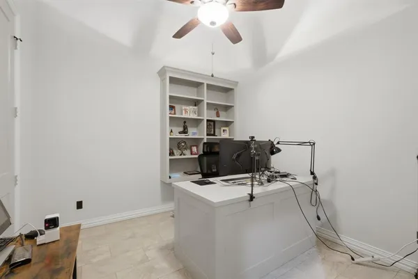 a view of a workspace with furniture
