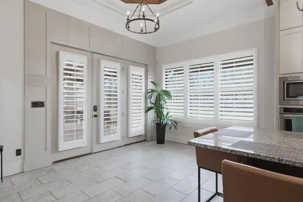 a view of room with furniture and windows