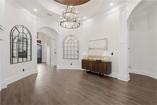 a view of entryway with wooden floor