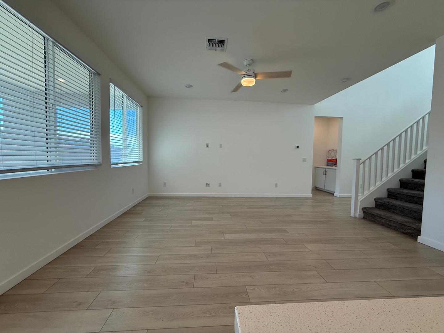 17760 West Cassia Way Goodyear, AZ 85338 - Photo 7 of 37 a view of an empty room with a window