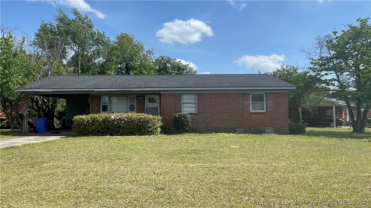 808 Bronco Road Fayetteville, NC 28303 - Photo 2 of 14 a view of a house with a yard