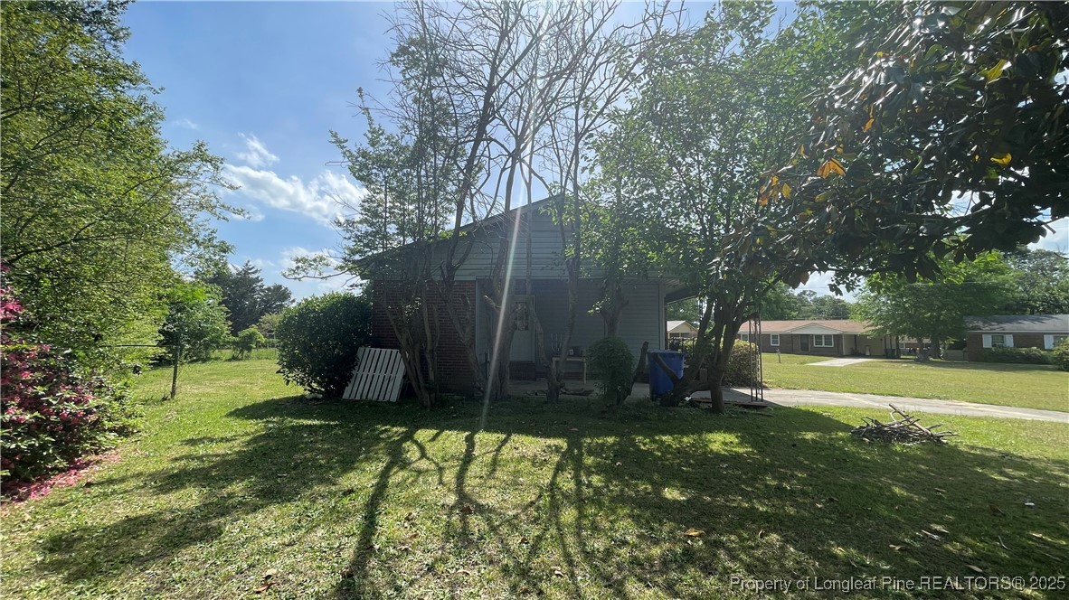 808 Bronco Road Fayetteville, NC 28303 - Photo 5 of 14 a view of a backyard