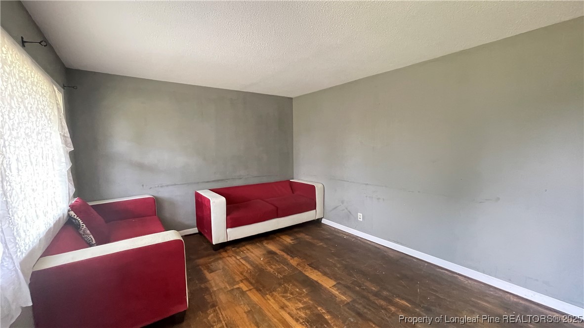808 Bronco Road Fayetteville, NC 28303 - Photo 8 of 14 a living room with furniture and a window