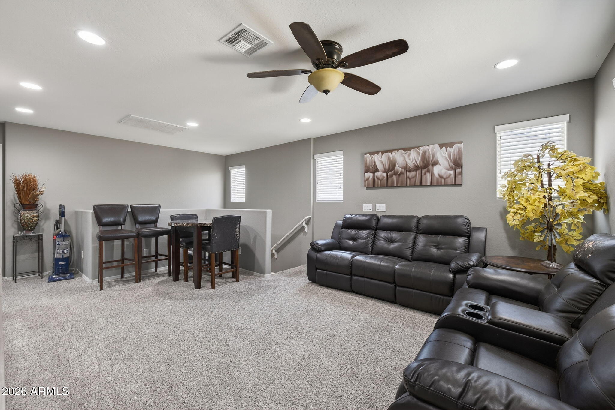 921 South Swallow Lane Gilbert, AZ 85296 - Photo 19 of 36 a living room with furniture and a large window