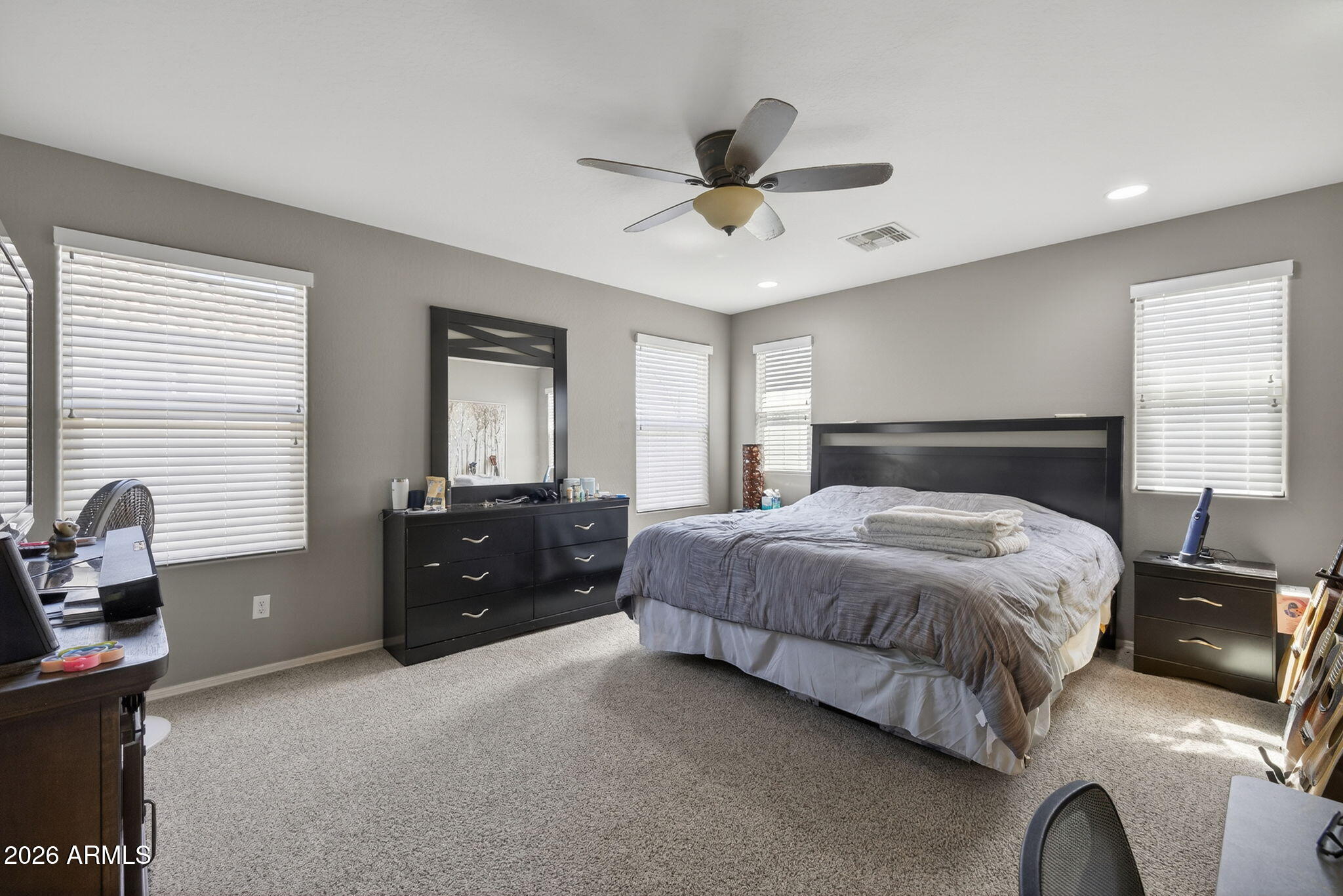 921 South Swallow Lane Gilbert, AZ 85296 - Photo 20 of 36 a bedroom with a bed and window
