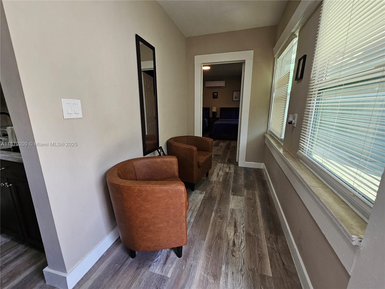 1265 Southwest 4th Street, Unit 4 Miami, FL 33130 - Photo 12 of 24 a close view of chair and wooden floor