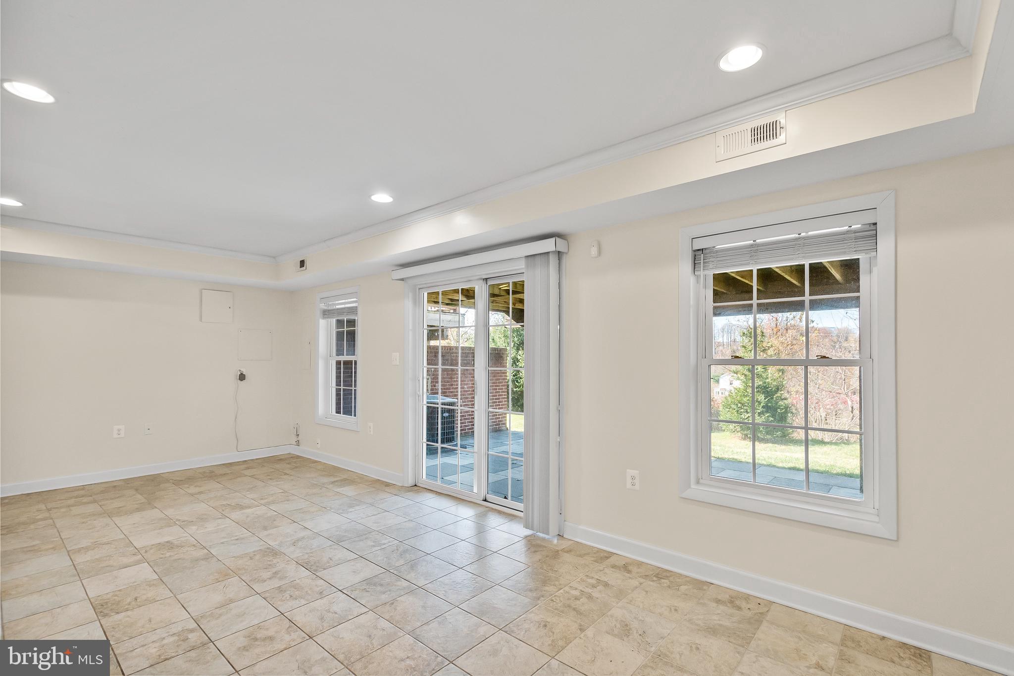 7872 Azalea Cove Terrace Alexandria, VA 22315 - Photo 27 of 30 a view of an empty room with a window