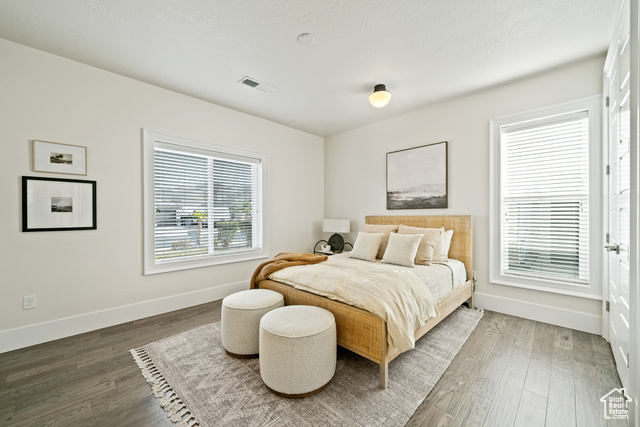 6026 Zen Trail Way St. George, UT 84790 - Photo 17 of 41 Bedroom featuring baseboards and wood finished floors