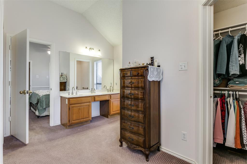 3414 Spring Willow Drive Grapevine, TX 76051 - Photo 17 of 25 a room with furniture and a view of walk in closet