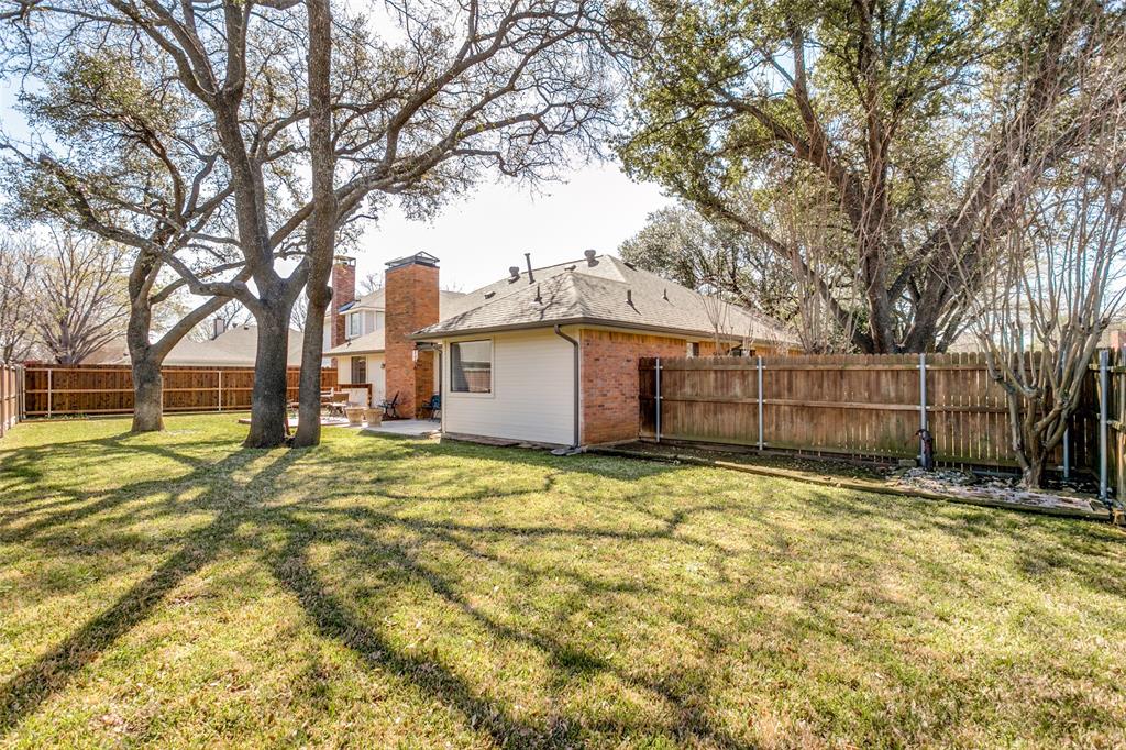 3414 Spring Willow Drive Grapevine, TX 76051 - Photo 25 of 25 a view of a backyard with large trees