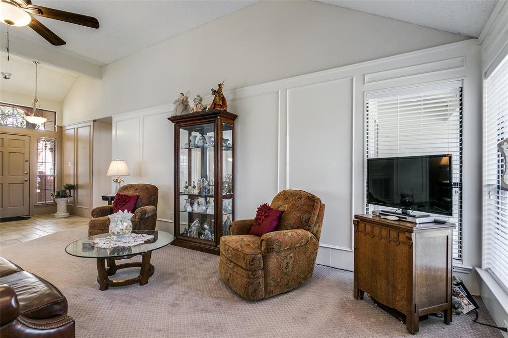 3414 Spring Willow Drive Grapevine, TX 76051 - Photo 3 of 25 a living room with furniture and a flat screen tv