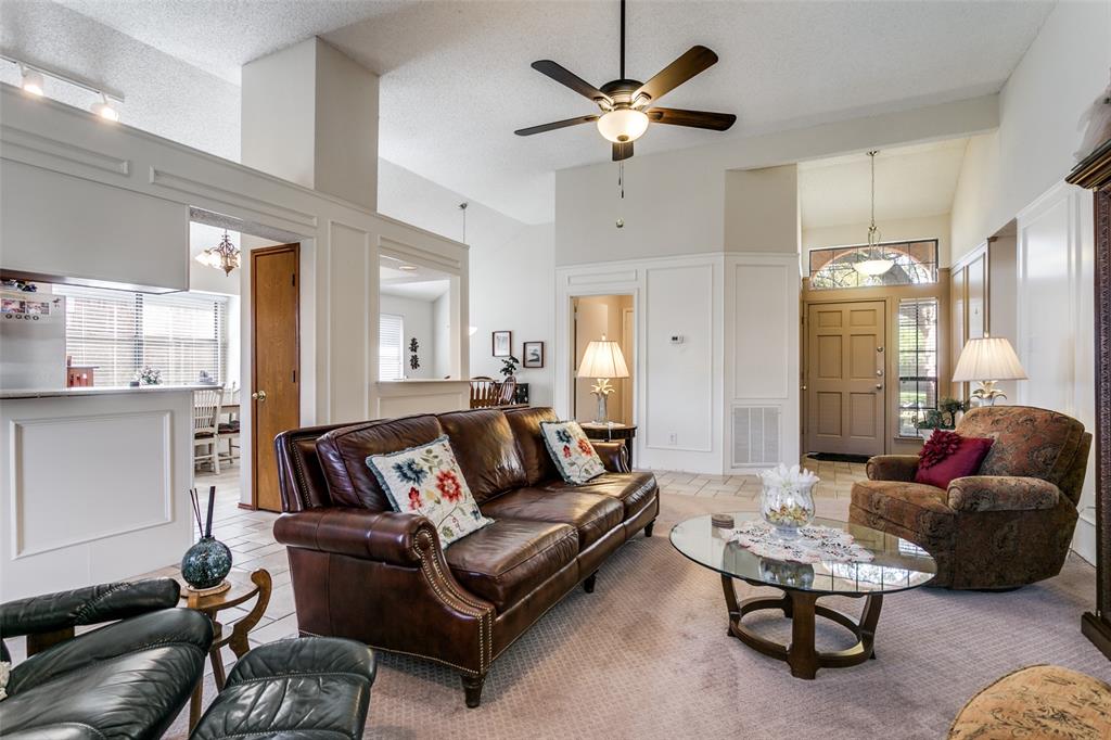 3414 Spring Willow Drive Grapevine, TX 76051 - Photo 4 of 25 a living room with furniture ceiling fan and a rug