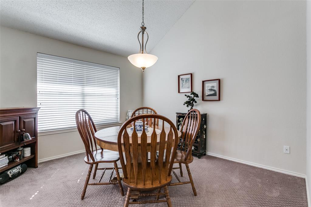 3414 Spring Willow Drive Grapevine, TX 76051 - Photo 8 of 25 a view of a dining room with furniture window and wooden floor