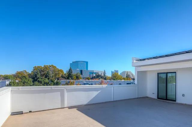 a view of a terrace with a bench