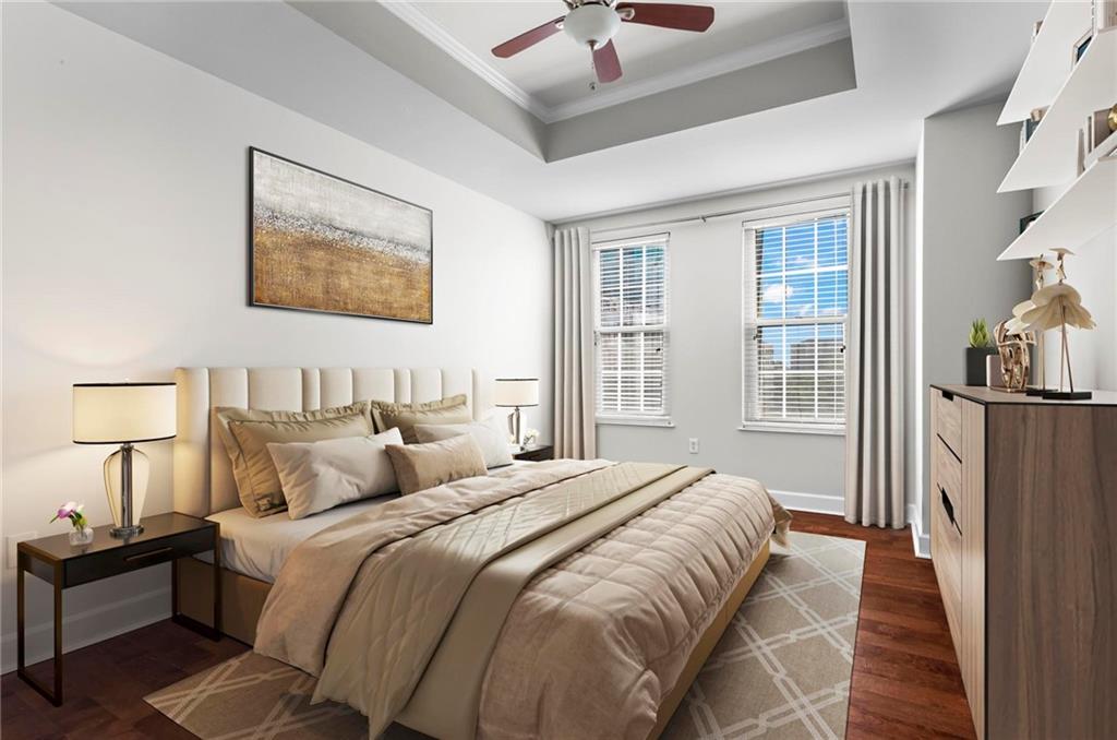 325 East Paces Ferry Road Northeast, Unit 703 Atlanta, GA 30305 - Photo 16 of 31 a bedroom with bed and a window