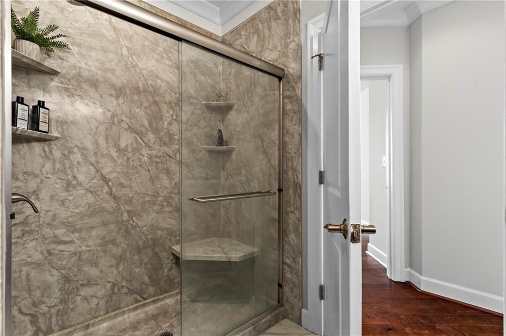 325 East Paces Ferry Road Northeast, Unit 703 Atlanta, GA 30305 - Photo 21 of 31 a bathroom with a shower