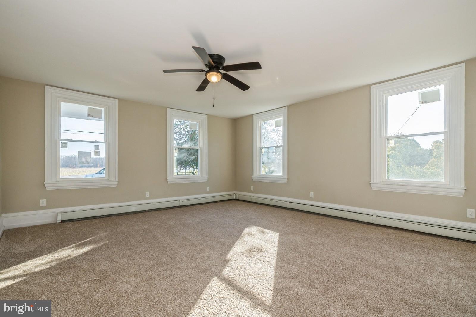 241 Glassboro Road Monroeville, NJ 08343 - Photo 8 of 24 a view of room with window and ceiling fan