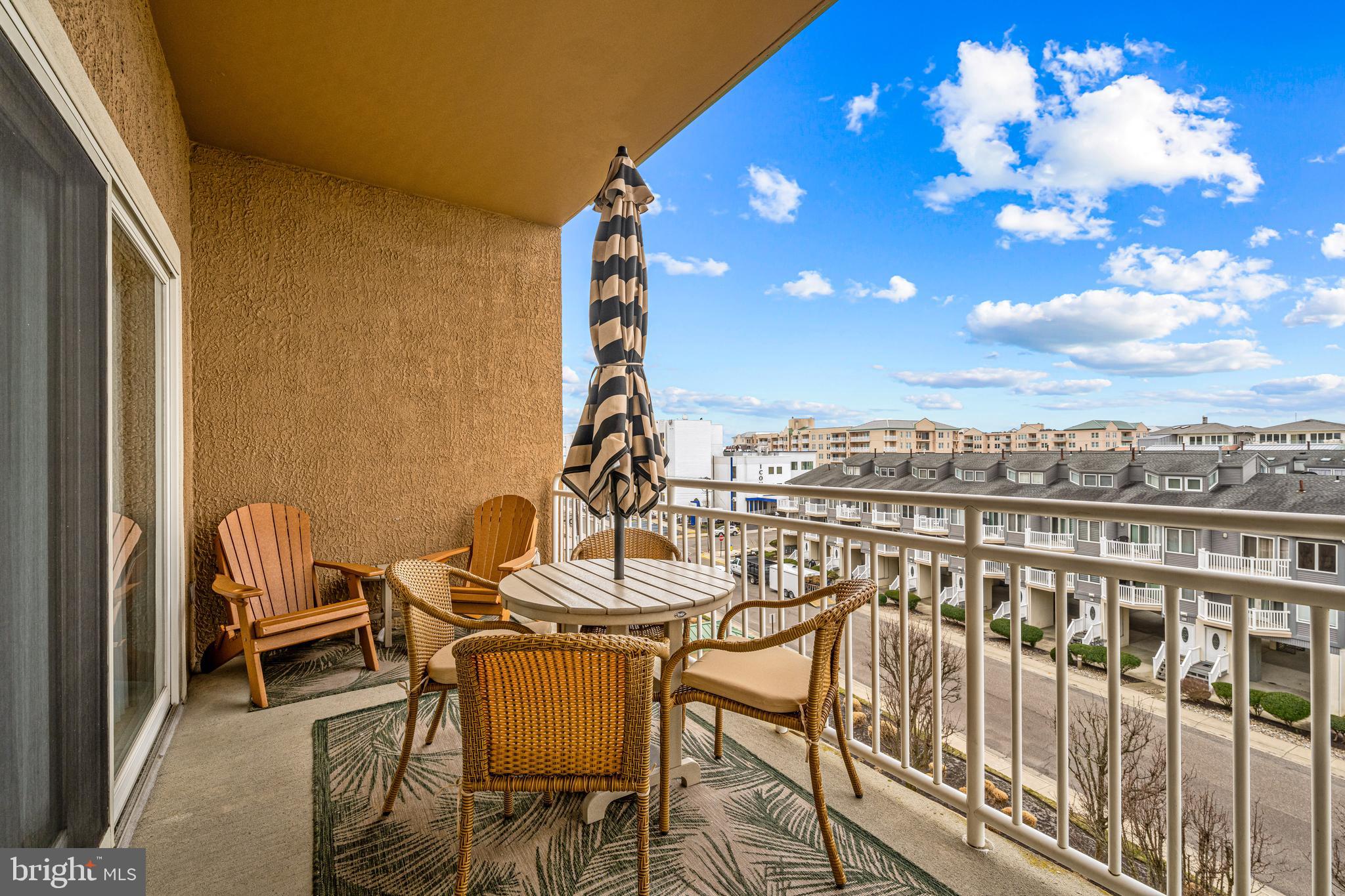 301 East Rochester Avenue, Unit 409 Wildwood, NJ 08260 - Photo 24 of 31 a view of a balcony with chairs