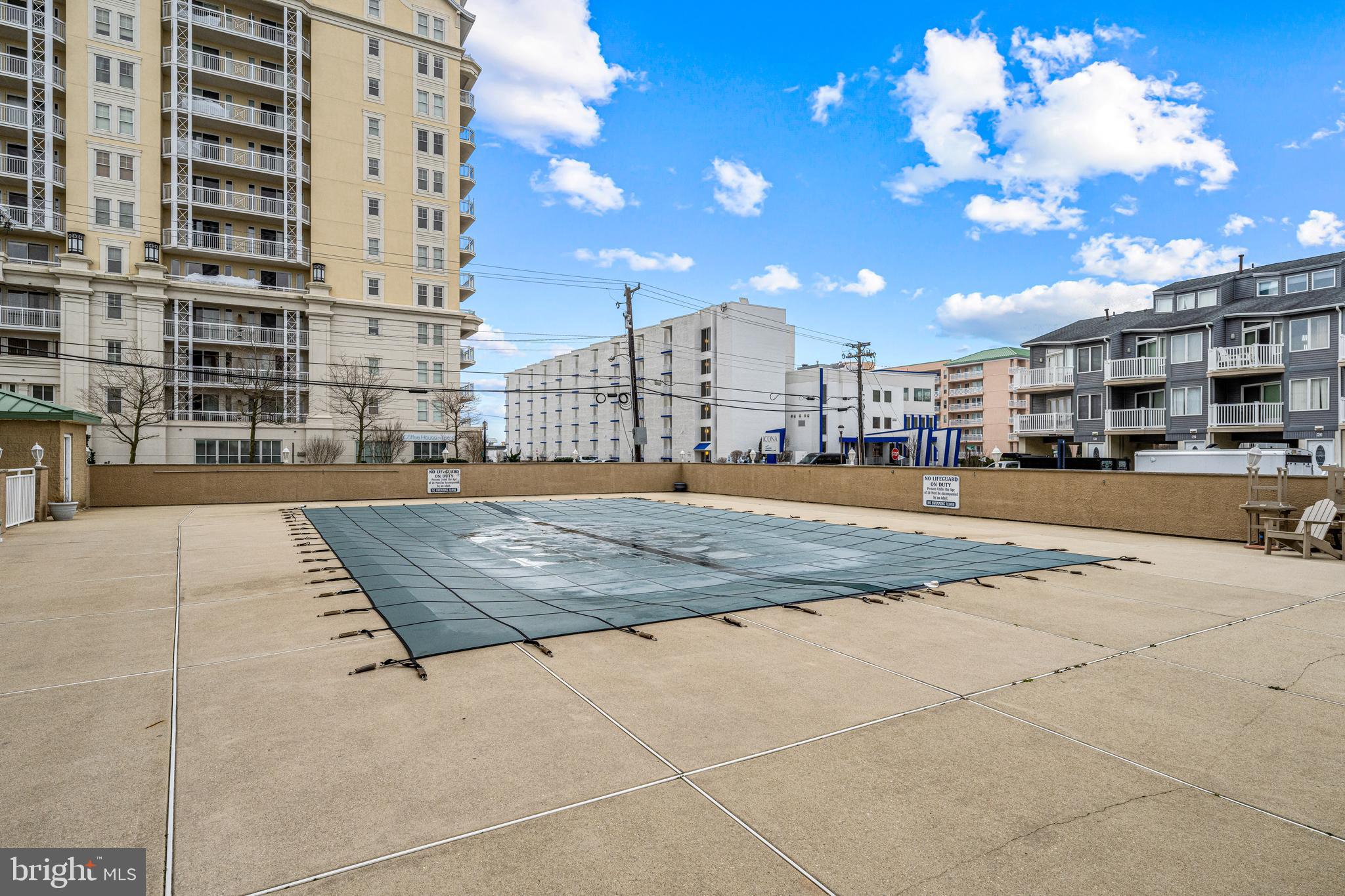 301 East Rochester Avenue, Unit 409 Wildwood, NJ 08260 - Photo 30 of 31 a view of buildings with yard