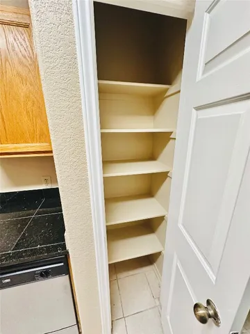 a kitchen that has a sink and a stove