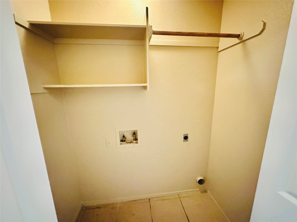 8814 Schick Road, Unit D Austin, TX 78729 - Photo 19 of 26 a bathroom with a shower