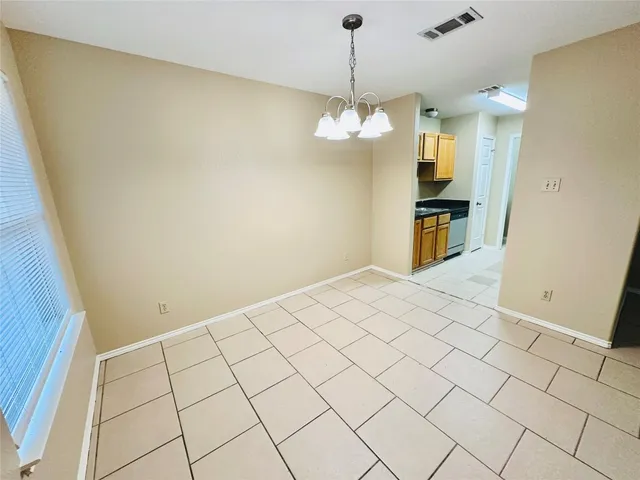 a view of a livingroom with a furniture