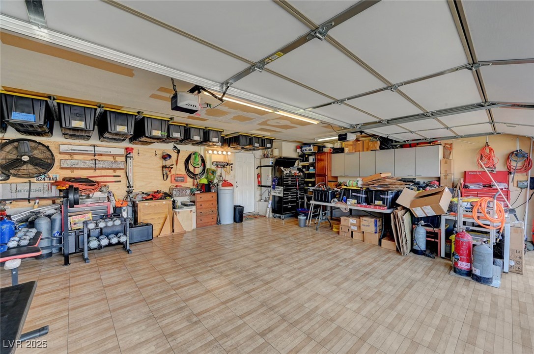 2410 Doherty Way Henderson, NV 89014 - Photo 60 of 63 3 car garage with a ton of overhead storage.