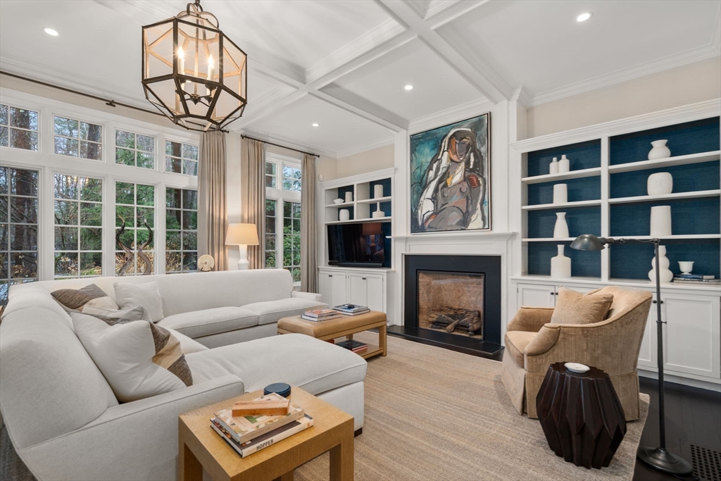 48 Scotch Pine Road Wellesley, MA 02481 - Photo 10 of 39 a living room with furniture a window and a fireplace