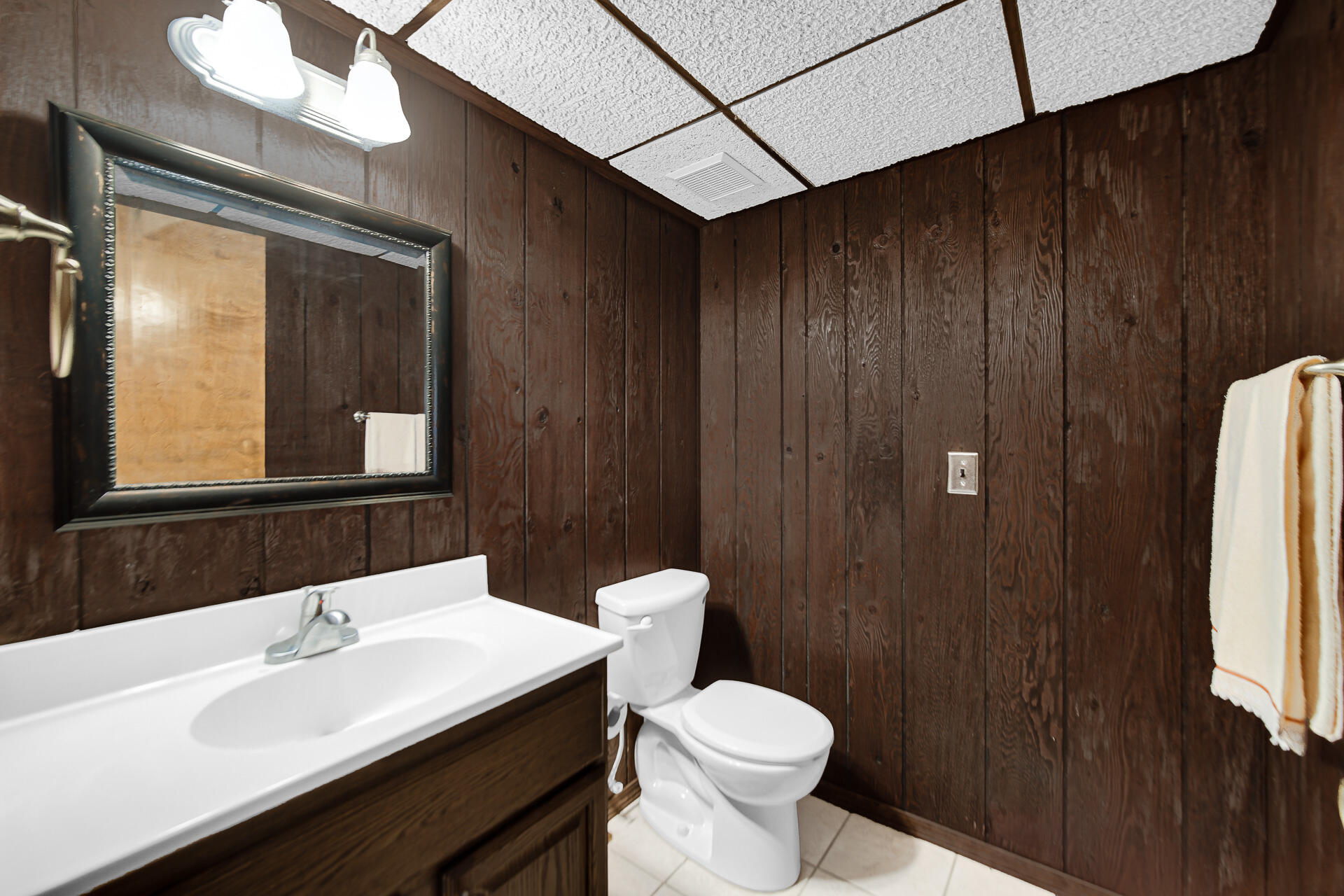 6955 Briergate Court Demotte, IN 46310 - Photo 34 of 44 a bathroom with a sink and a mirror