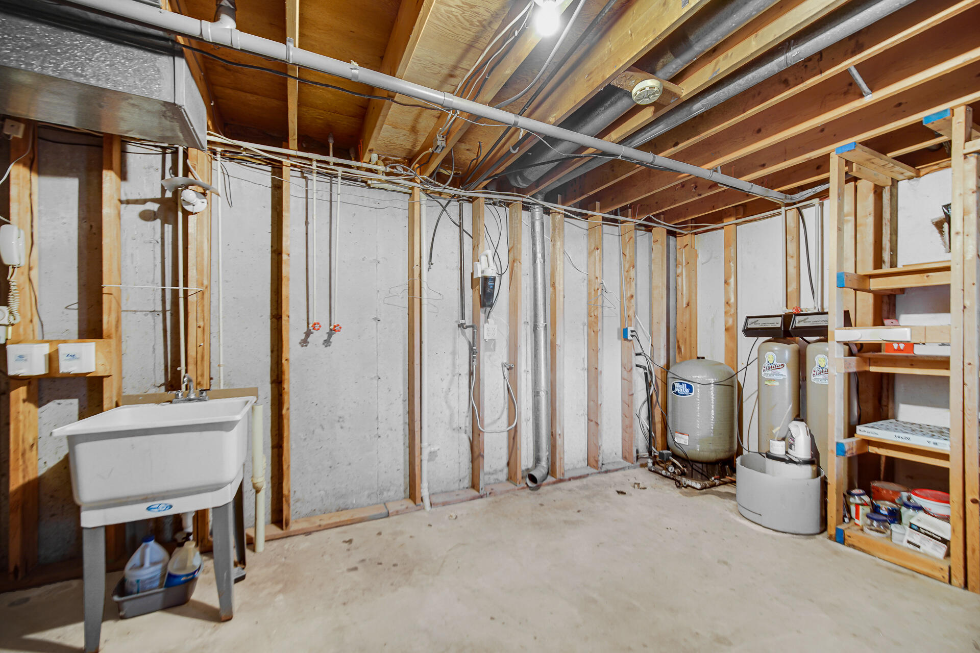 6955 Briergate Court Demotte, IN 46310 - Photo 37 of 44 a view of a storage room with an empty shelves