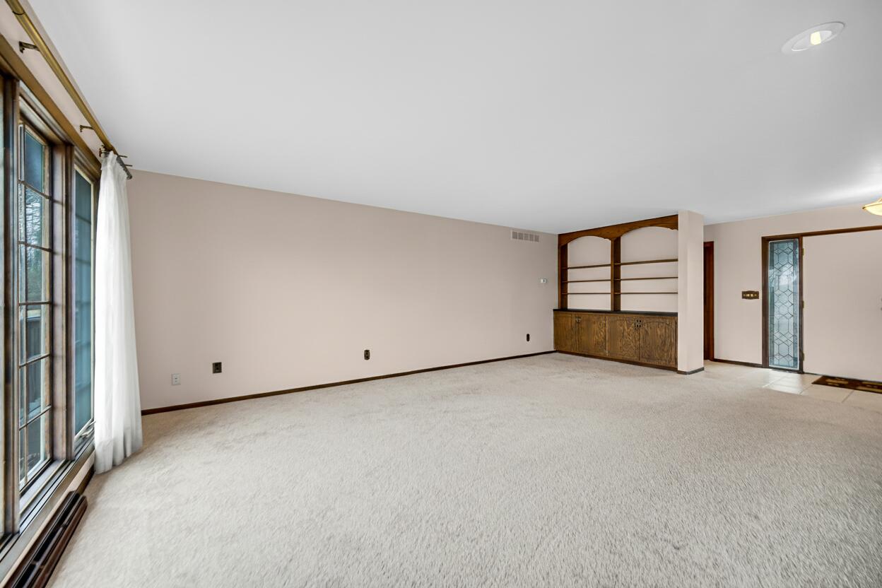 6955 Briergate Court Demotte, IN 46310 - Photo 7 of 44 a view of a room with a large window