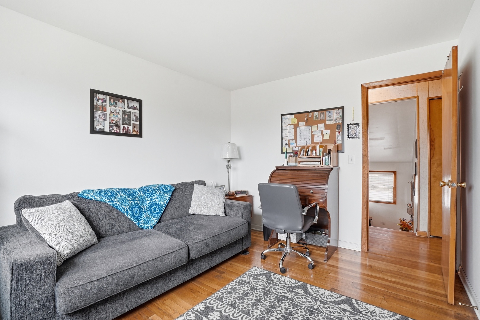 538 West Avenue Elmhurst, IL 60126 - Photo 11 of 22 a living room with furniture and a wooden floor