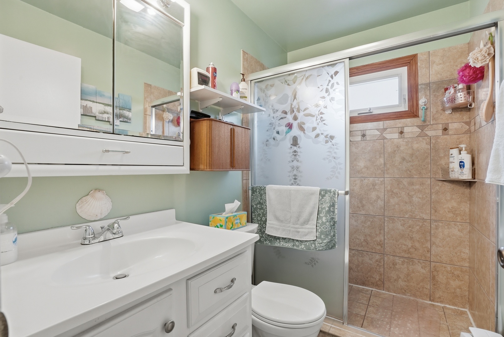 538 West Avenue Elmhurst, IL 60126 - Photo 13 of 22 a bathroom with a sink a toilet and shower