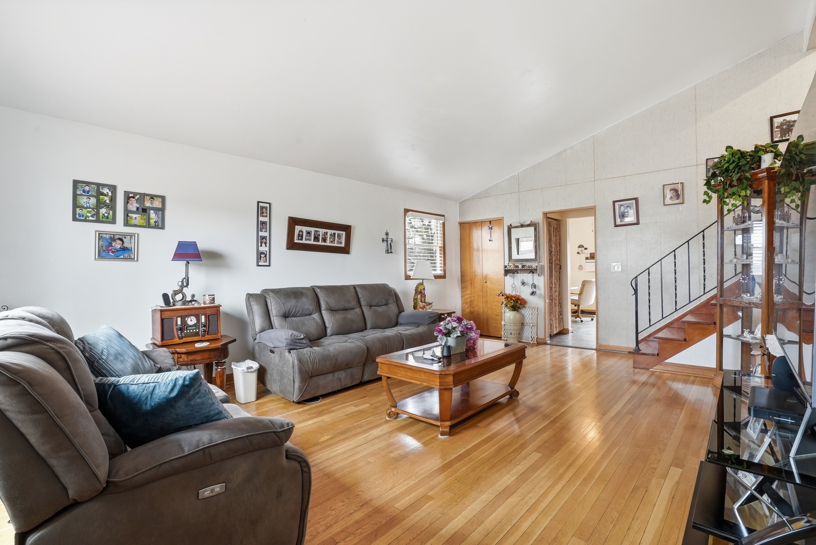 538 West Avenue Elmhurst, IL 60126 - Photo 2 of 22 a living room with furniture and a wooden floor