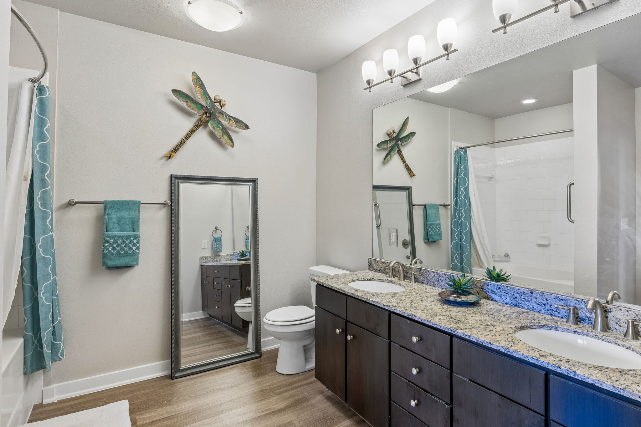1900 Barton Springs Road, Unit 5032 Austin, TX 78704 - Photo 24 of 40 Double vanity featuring undermount sinks and a speckled countertop