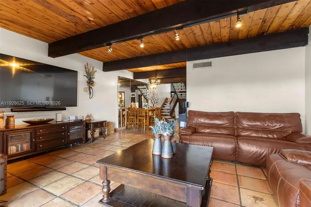 a living room with a couch and a table