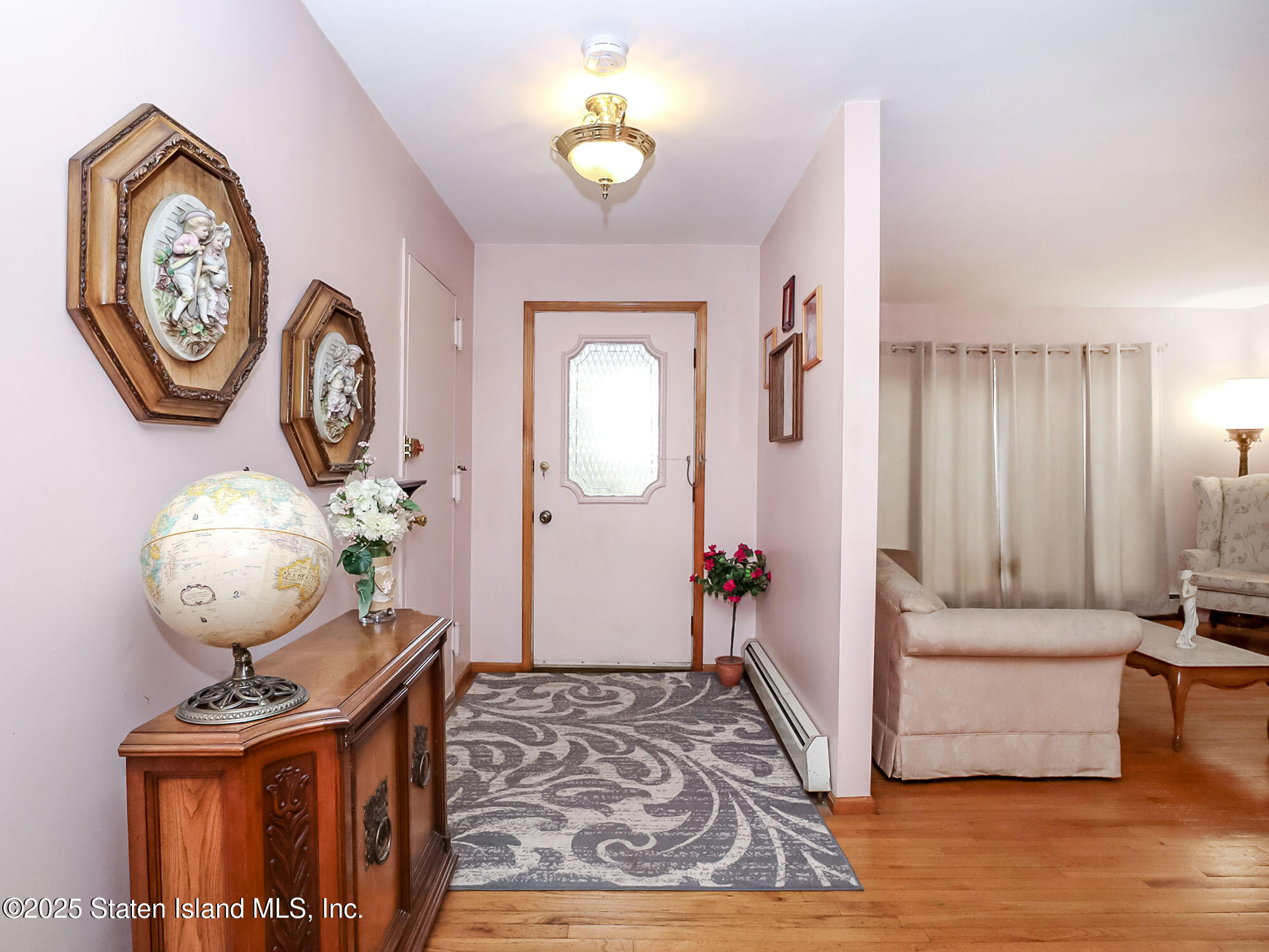 282 Boscombe Avenue Staten Island, NY 10309 - Photo 2 of 34 a view of a livingroom with furniture