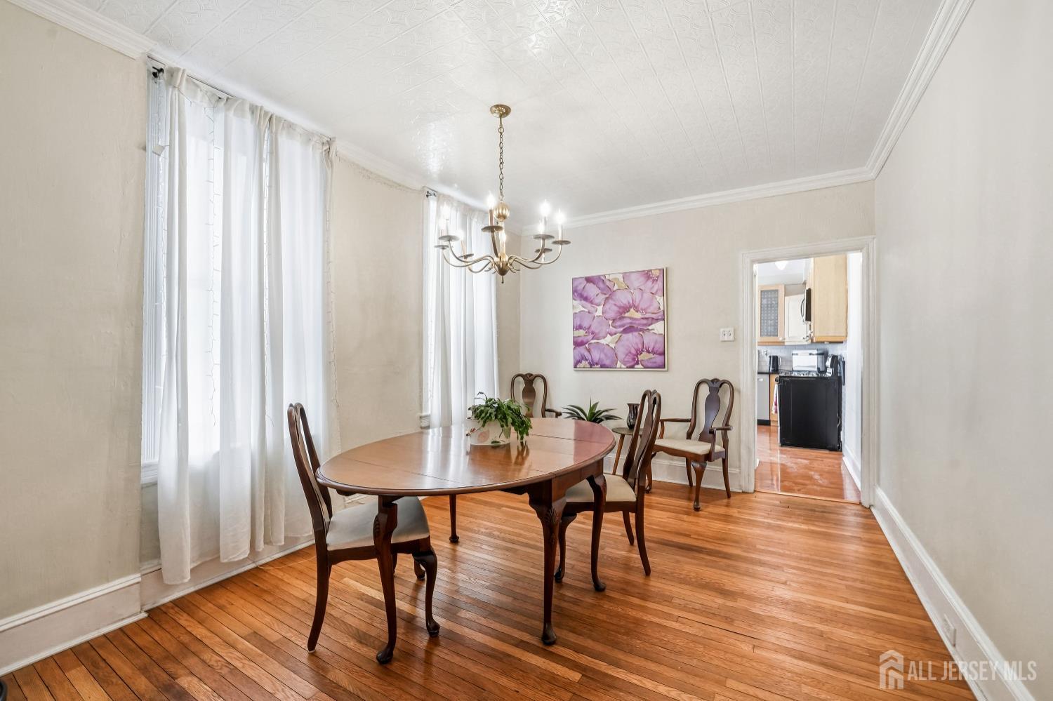 346 East Union Street Burlington, NJ 08016 - Photo 13 of 48 a view of a dining room with furniture window and wooden floor
