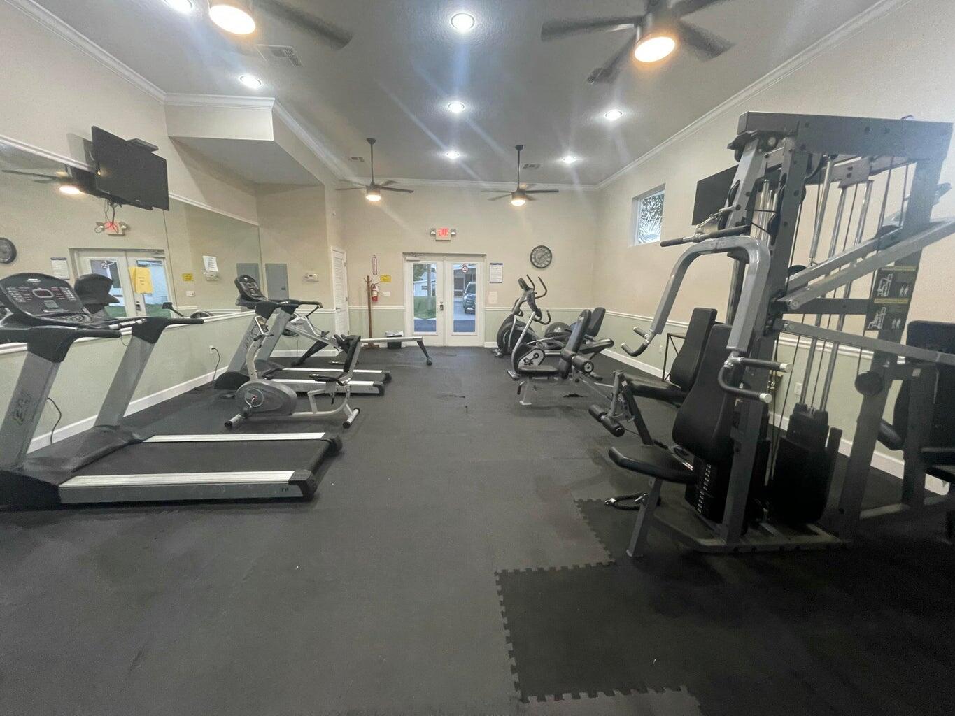 356 Mockingbird Avenue Fort Pierce, FL 34982 - Photo 11 of 12 a view of a room with gym equipment
